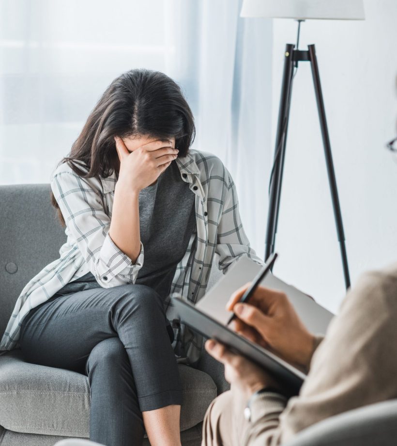 stressed-woman-sitting-in-chair-at-male-doctor-off-2023-11-27-05-10-34-utc (2)
